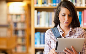 Woman Reading on iPad